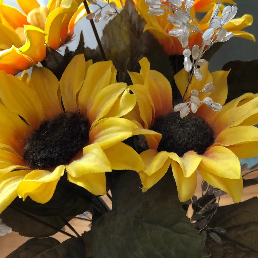 Faux sunflower florals with jewels in milk jar